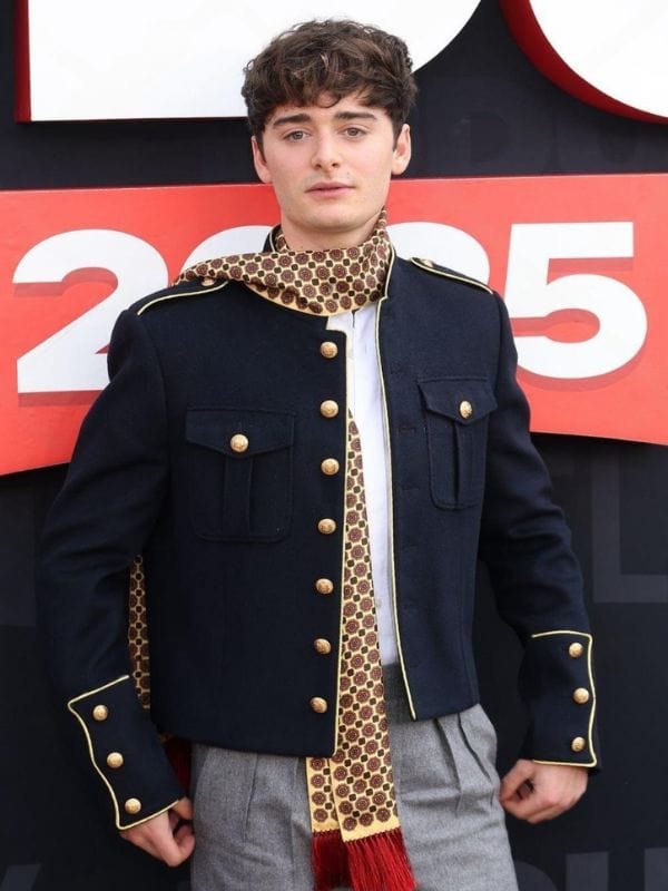Netflix Tudum 2025 Noah Schnapp Dark Blue Mlitary Jacket