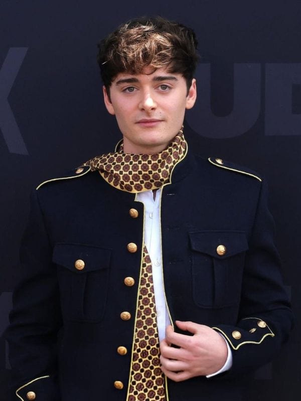 Netflix Tudum 2025 Noah Schnapp Dark Blue Mlitary Jacket