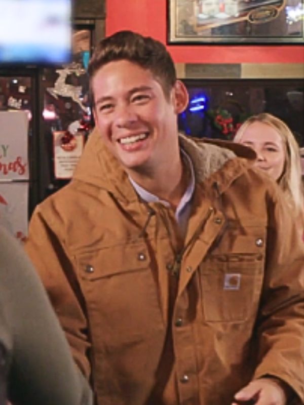 Juan David Daza in 90 Day Fiancé Season 11 wearing a brown sherpa-lined hooded jacket – casual and cozy outerwear