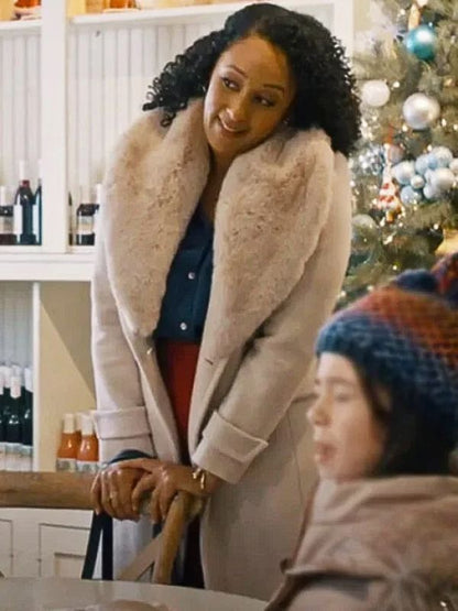 Tamera Mowry-Housley Scouting For Christmas Shearling Coat